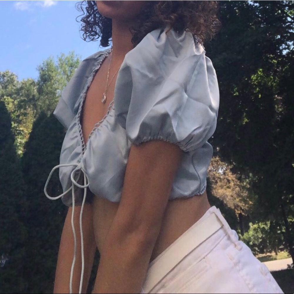 Light blue crop top.